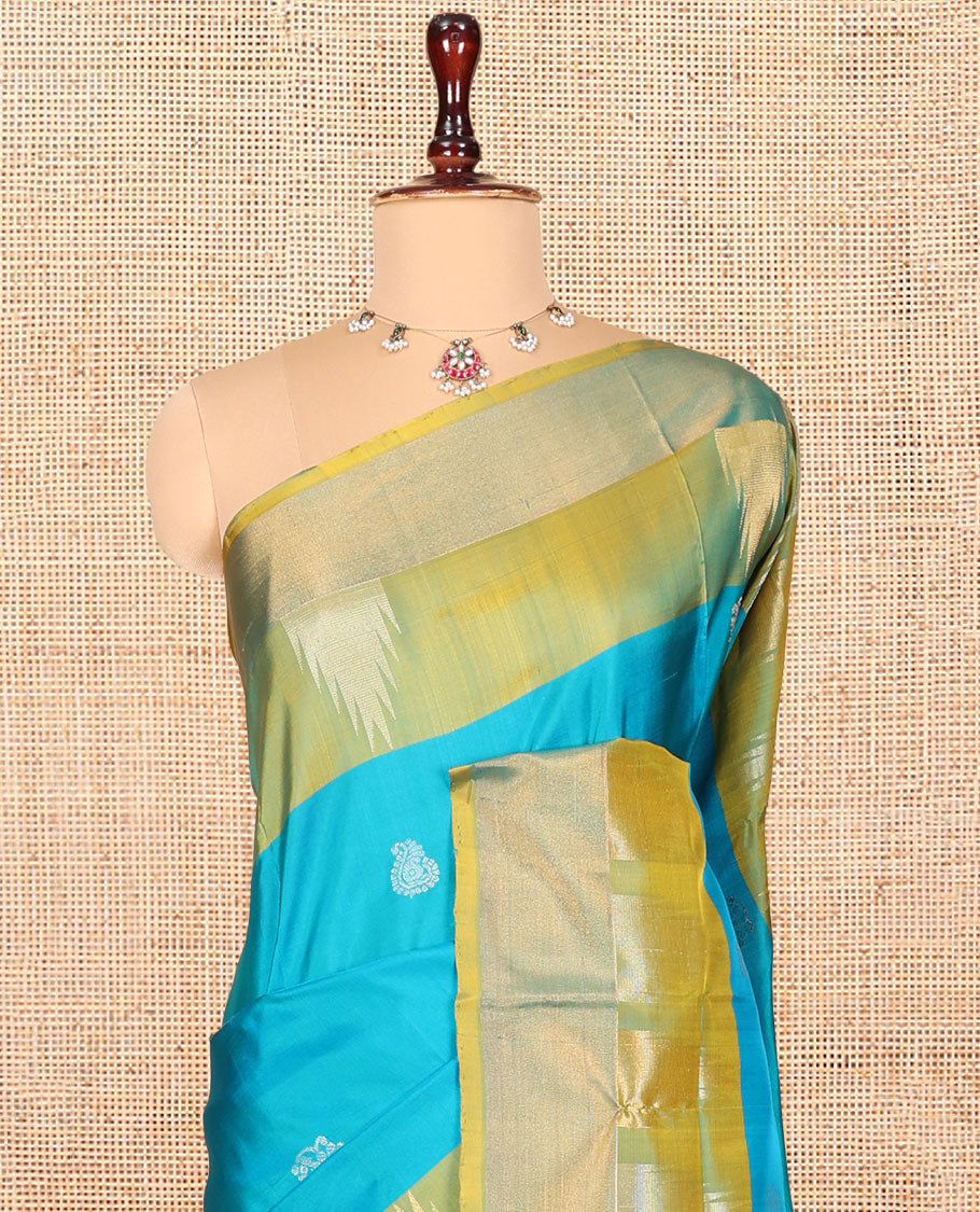 Blue Uppada Silk Saree, Woven with Buttas, Complemented by a Contrast Temple Zari Border, Contrast Intricately Designed Pallu, and a Contrast Blouse