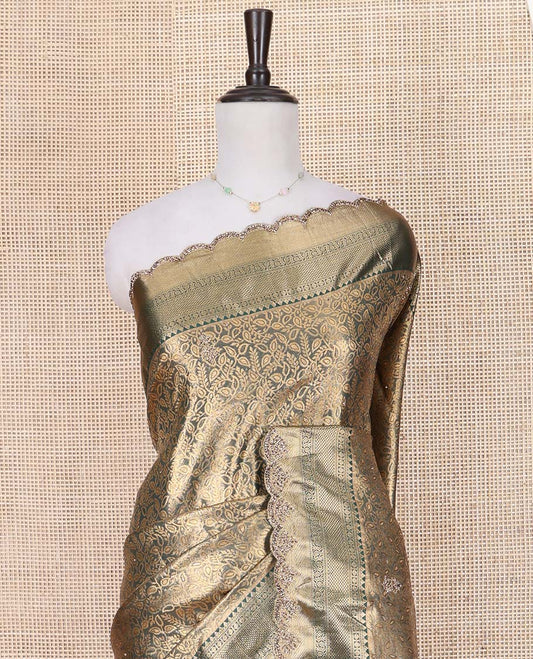Green Vastrakala Silk Saree, Elegantly Highlighted with Floral Jacquard and Patch Stone Work, Highlighted by Traditional Zari and Stone Scallop Border, Grand Scallop Design Stone Work Pallu, and Paired with Heavy Embroidered Blouse