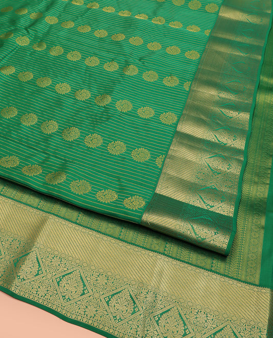 Green Vasundhara Lite Silk Mix Saree, Subtly Sparkled with Zari Buttas All Over Its Body, Complemented by Zari Border, Grand Pallu Steeped with Traditional Designs, and Paired with a Matching Blouse