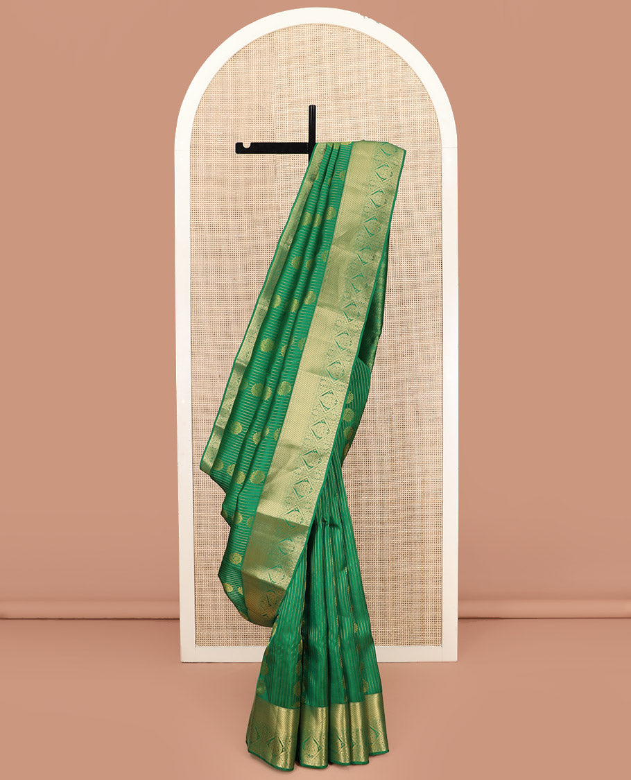 Green Vasundhara Lite Silk Mix Saree, Subtly Sparkled with Zari Buttas All Over Its Body, Complemented by Zari Border, Grand Pallu Steeped with Traditional Designs, and Paired with a Matching Blouse