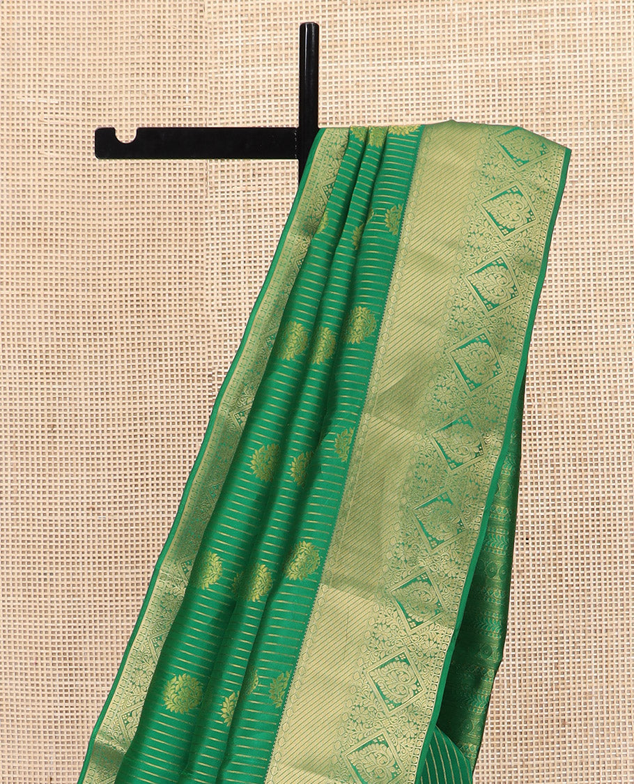 Green Vasundhara Lite Silk Mix Saree, Subtly Sparkled with Zari Buttas All Over Its Body, Complemented by Zari Border, Grand Pallu Steeped with Traditional Designs, and Paired with a Matching Blouse