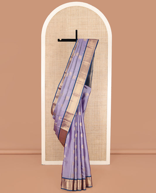 Lavender Vasundhara Lite Silk Mix Saree, Spotlighted with Zari Buttas on Its Body, Complemented by a Contrast Border of Thilakam, Muthu, Mayil Kann, Neli, and Manga Designs, Grandly Woven Pallu, and Paired with a Contrast Blouse