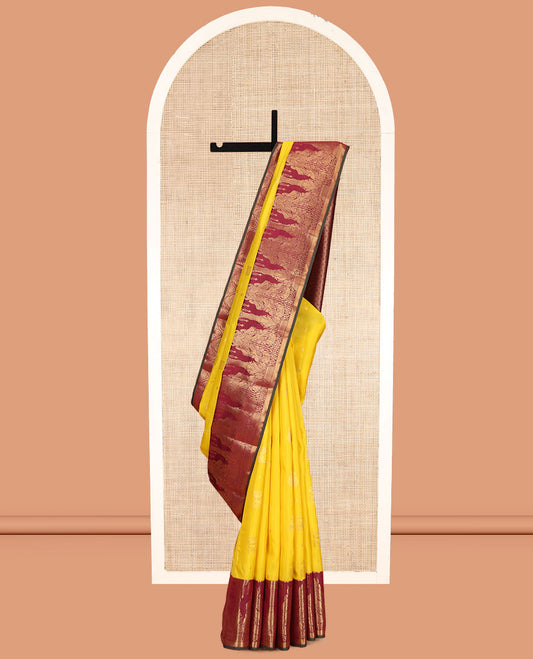 Yellow Vasundhara Lite Silk Mix Saree, Sparsely Woven with Zari Buttas, Contrast Border of Divine and Mythological Animal Characters, Grand Pallu, and a Contrast Blouse