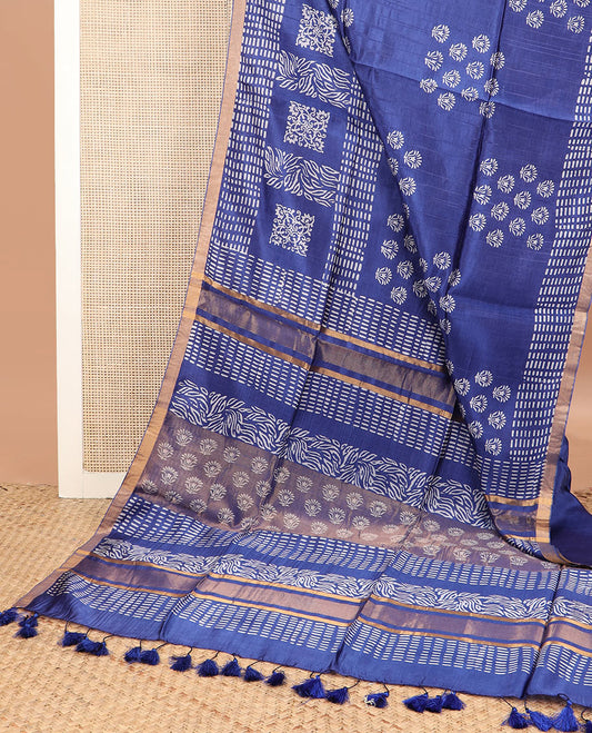 Blue floral and geometric printed banana pith saree, zari border, and printed pallu