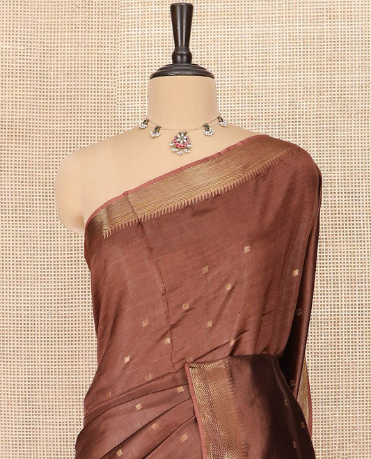 Brown Banana Pith Saree Adorned with Zari Buttas, Temple Border of Zari Designs, Subtle Pallu of Zari Designs, and Paired with a Matching Blouse