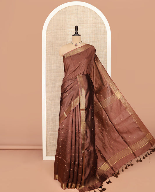 Brown Banana Pith Saree Adorned with Zari Buttas, Temple Border of Zari Designs, Subtle Pallu of Zari Designs, and Paired with a Matching Blouse