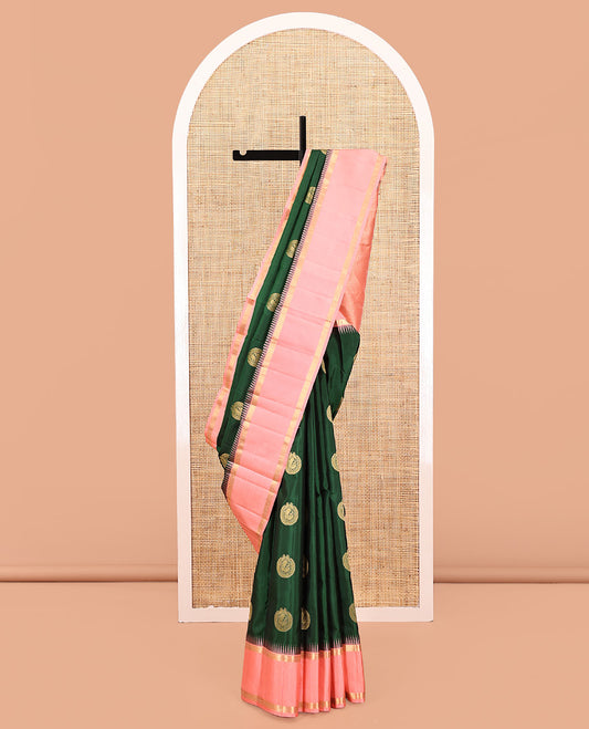 Green Vasundhara Silk Saree, Finely Crafted with Round Mayil Buttas All Over Its Body, Complemented by a Contrast Rettai Pettu Temple Border of Zari Designs, Grand Jaal Pallu, and Paired with a Contrast Blouse