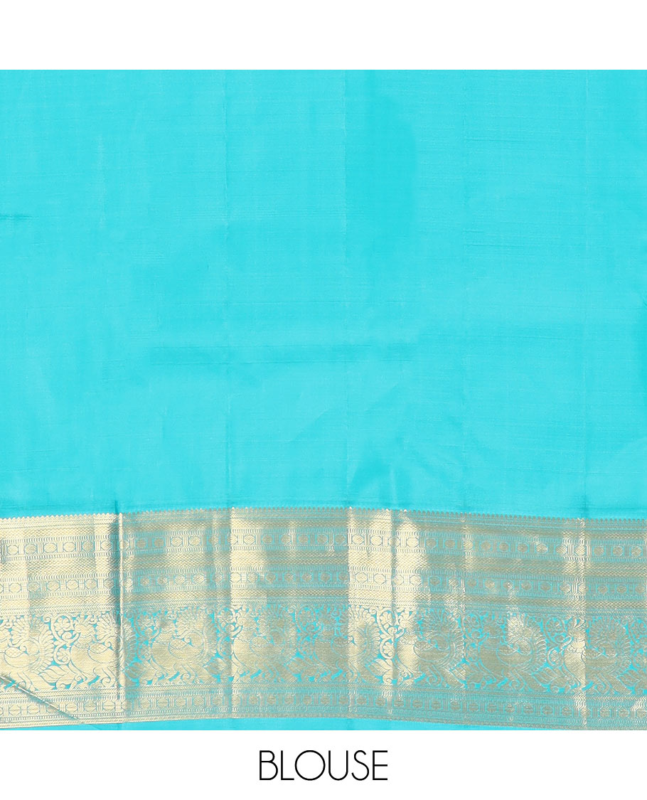 Red Vasundhara Silk Saree, Traditionally Decked up with Navagunjara Buttas, Complemented by a Contrast Border of Rekku, Kathir, Rudraksham, Muthu, and Mayil Designs, Adorned with a Pallu of Jaal Design, and Paired with a Contrast Blouse