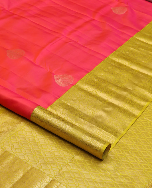 Red zari buttas silk saree, contrast border of thilakam mokku, muthu, yaali, and mayil kann, and geometric pallu