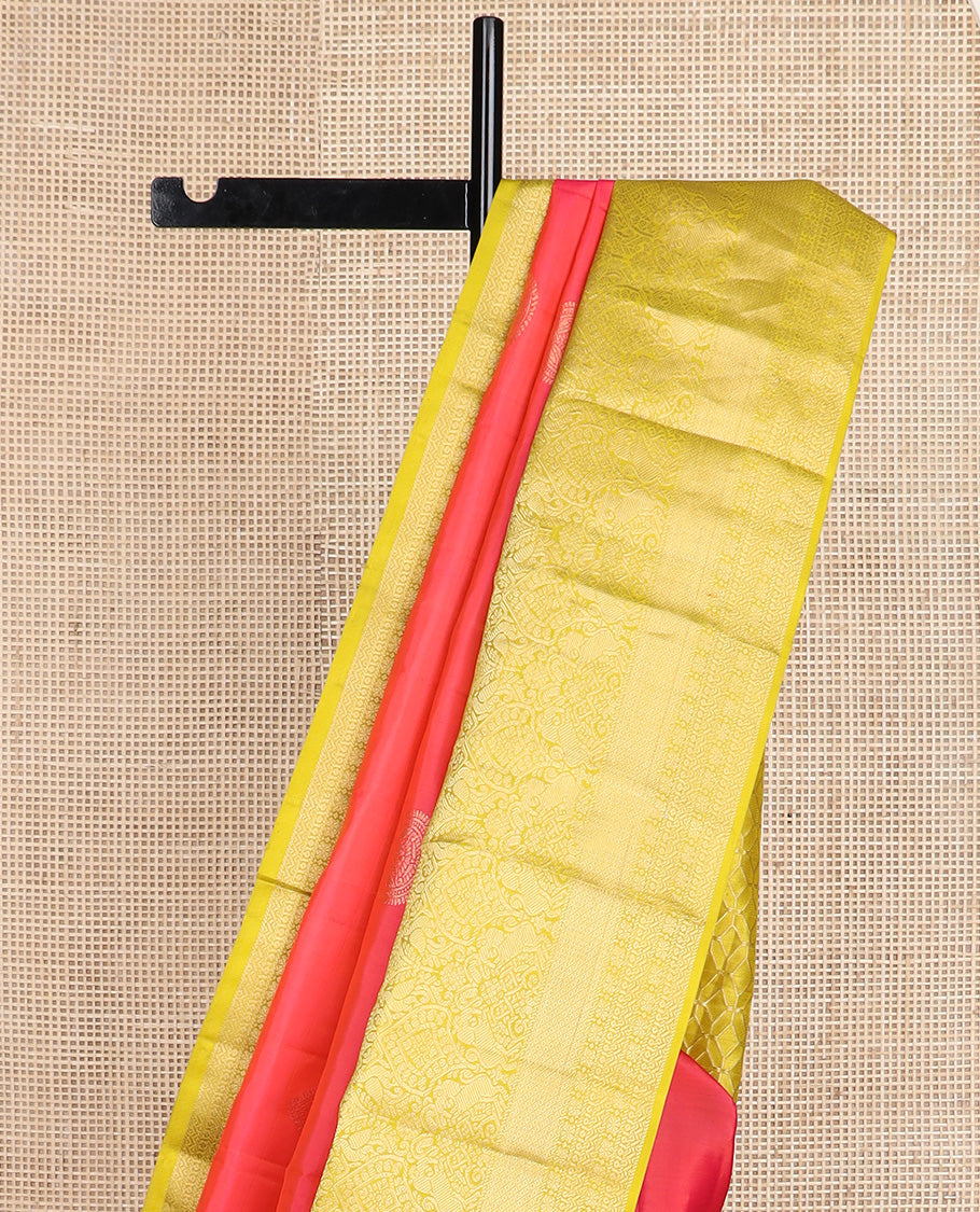 Red zari buttas silk saree, contrast border of thilakam mokku, muthu, yaali, and mayil kann, and geometric pallu