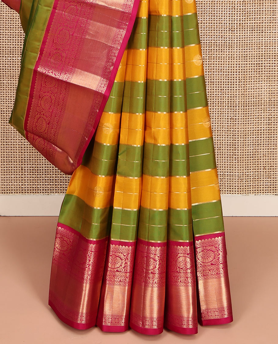 Green-Yellow Vasundhara Silk Saree, Embellished with Zari Buttas and Zari Stripes All Over Its Body, Complemented by a Contrast Border of Thilakam Mokku, Banaras, Muthu, and Kodi Visiry Designs, Pallu of Vanki Designs, and Paired with a Contrast Blouse