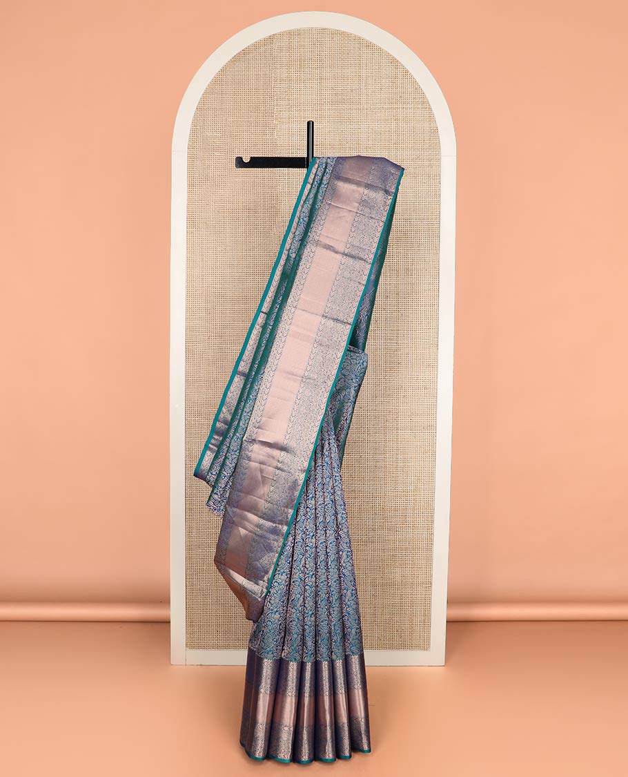 Blue jacquard Kanchipuram wedding silk saree, zari border of rekku, muthu, manga, and mayil kan designs, and intricate zari pallu