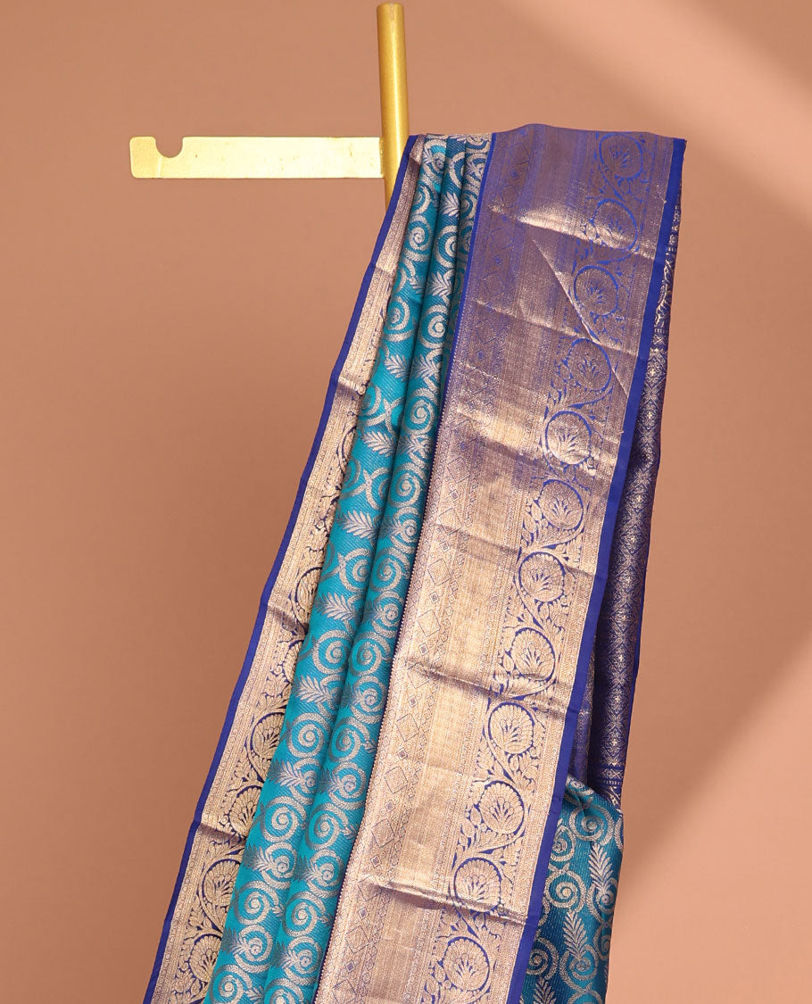 Blue leaf jacquard kancheepuram silk saree with contrast zari border & intricate zari design pallu