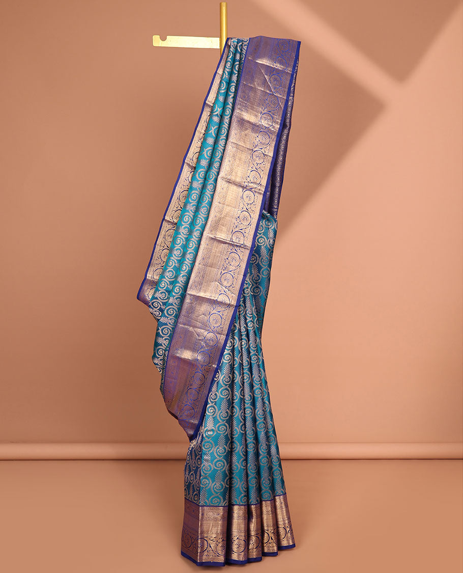 Blue leaf jacquard kancheepuram silk saree with contrast zari border & intricate zari design pallu