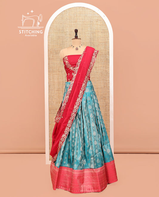 Blue Art Silk Half Saree Features Buttas Woven Skirt, Contrast Traditional Border, an Embroidered Blouse, and Contrast Scallop Embroidered Dhavani