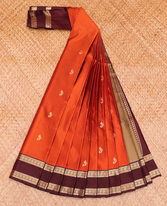 Rust Orange Budget Silk Saree Elevated with Paisley Buttas, Complemented by a Contrast Rettai Pettu Traditional Zari Border, Enriched with an Intricately Designed Pallu, and Paired with a Contrast Blouse