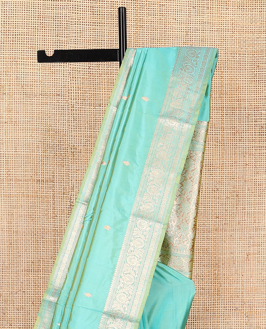 Turquoise buttas kathan silk saree, floral creeper border, and Mughal-style floral jaal pallu