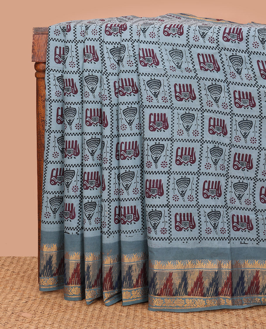 Grey Sungudi Cotton Saree Artfully Printed with Butta Enclosed Checks, Highlighted by Contrast Zari and Print Work Temple Border, and Pallu Printed with Patola Motifs