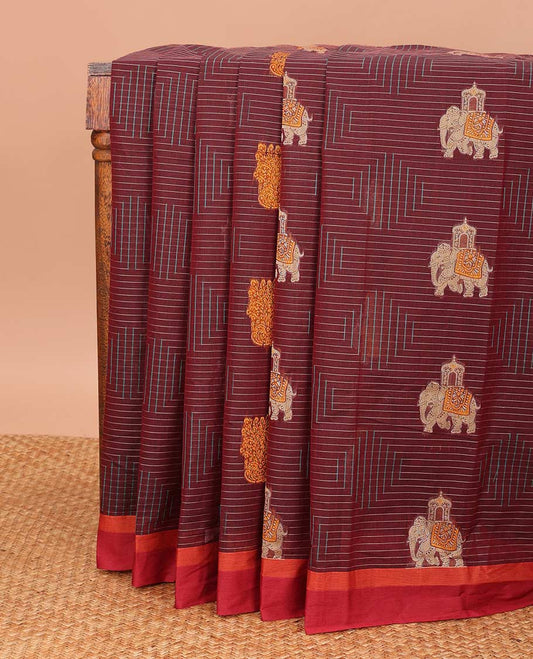 Maroon geometric and animal motifs printed Coimbatore cotton saree, contrast border, and pallu of elephant, peacock and leaf motifs