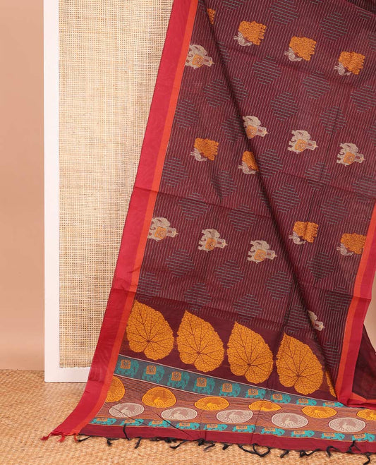 Maroon geometric and animal motifs printed Coimbatore cotton saree, contrast border, and pallu of elephant, peacock and leaf motifs