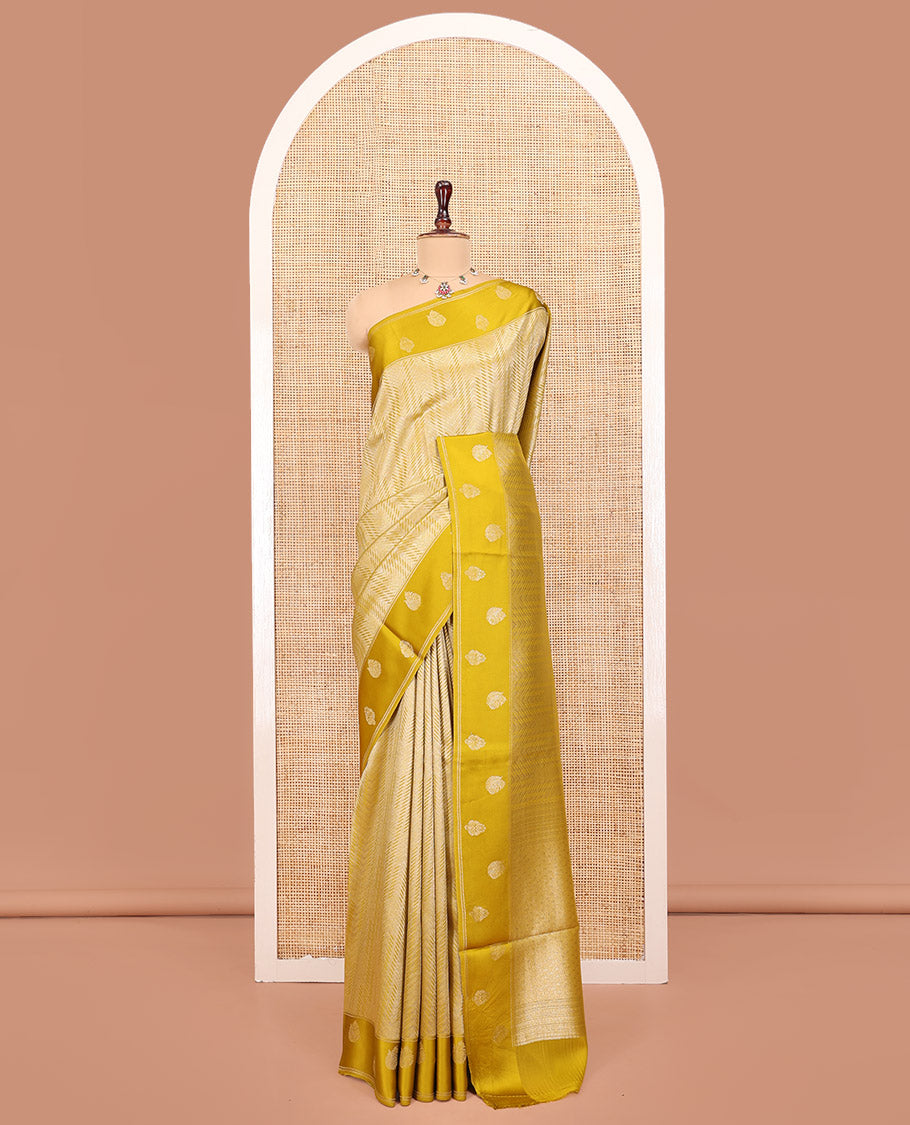 Mustard Russian Dola Silk Saree, Opulently Embellished with Zari Zig-Zag Jacquard on Its Body, Highlighted by Zari Buttas Woven Satin Border, Intricately Designed Pallu, and Paired with a Matching Blouse