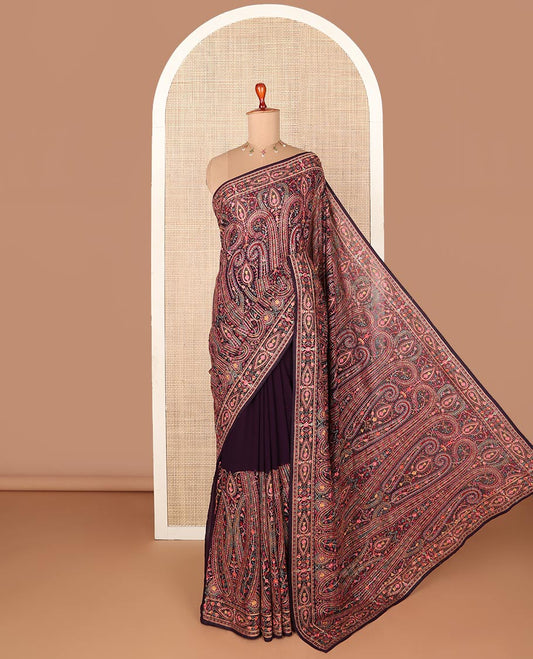 Wine color designer saree featuring kaleidoscopic-colored intricate & heavy thread embroidery