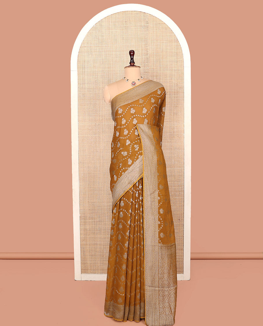 Mustard Georgette Saree, Adorned with Buttas and Stripes, Highlighted by a Traditional Border, Intricately Designed Pallu, and a Matching Blouse