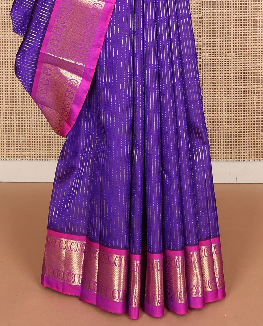 Violet zari buttas Kanchipuram silk saree, contrast one-sided border of laddu kamalam, and mayil kann designs, and intricate pallu