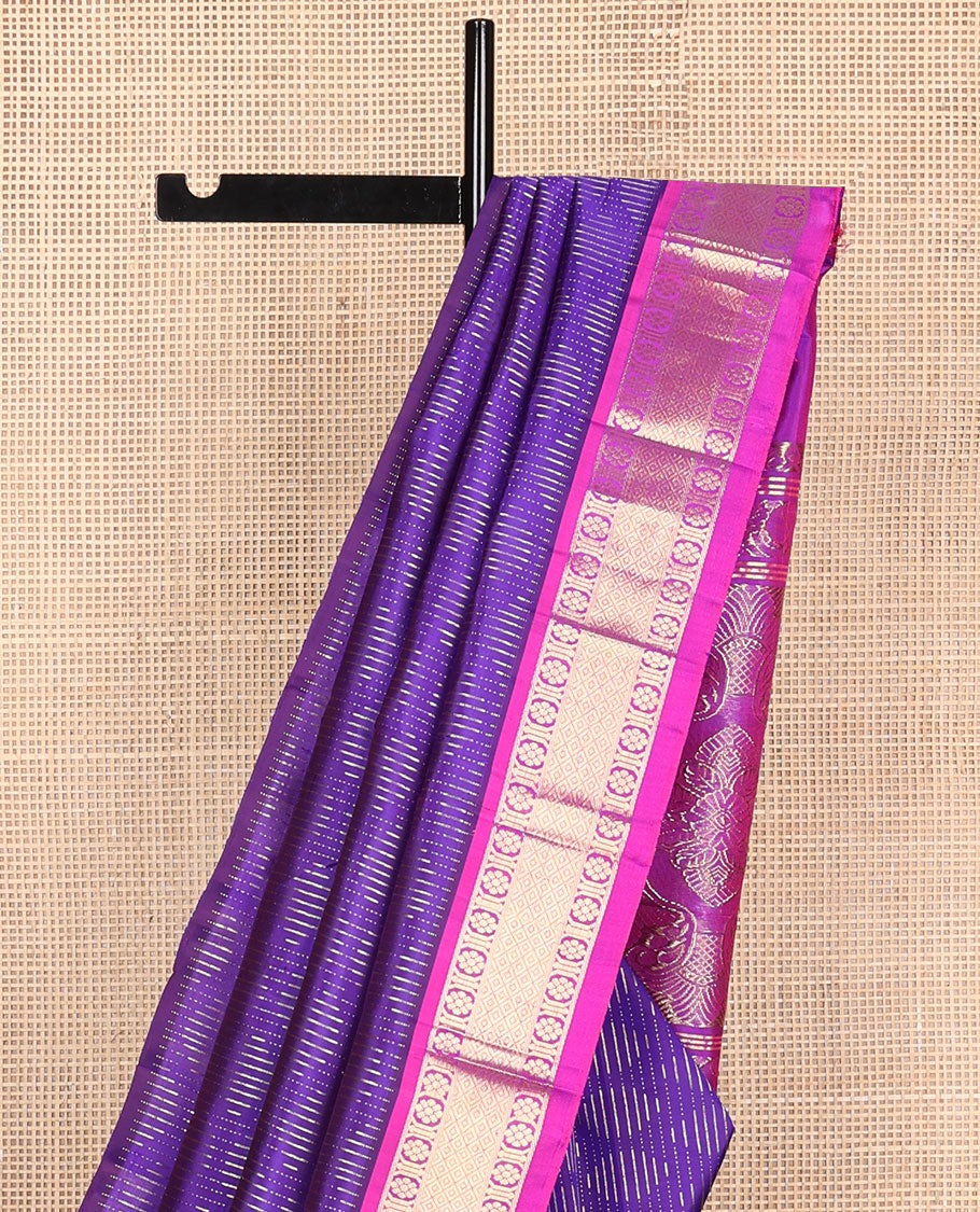Violet zari buttas Kanchipuram silk saree, contrast one-sided border of laddu kamalam, and mayil kann designs, and intricate pallu