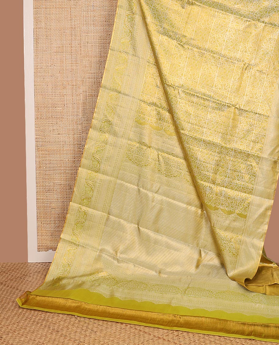 Green Kanchipuram Tissue Silk Saree, Detailed with Jacquard Design on Its Body, Highlighted by a Zari Border of Kathir, Mayil Kann, and Dhavana Kodi Designs, Gracefully Embellished Pallu, and Paired with a Matching Blouse