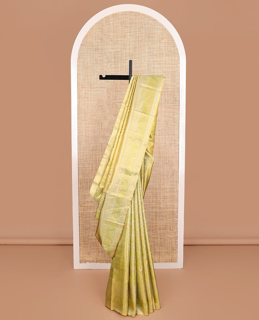 Green Kanchipuram Tissue Silk Saree, Detailed with Jacquard Design on Its Body, Highlighted by a Zari Border of Kathir, Mayil Kann, and Dhavana Kodi Designs, Gracefully Embellished Pallu, and Paired with a Matching Blouse