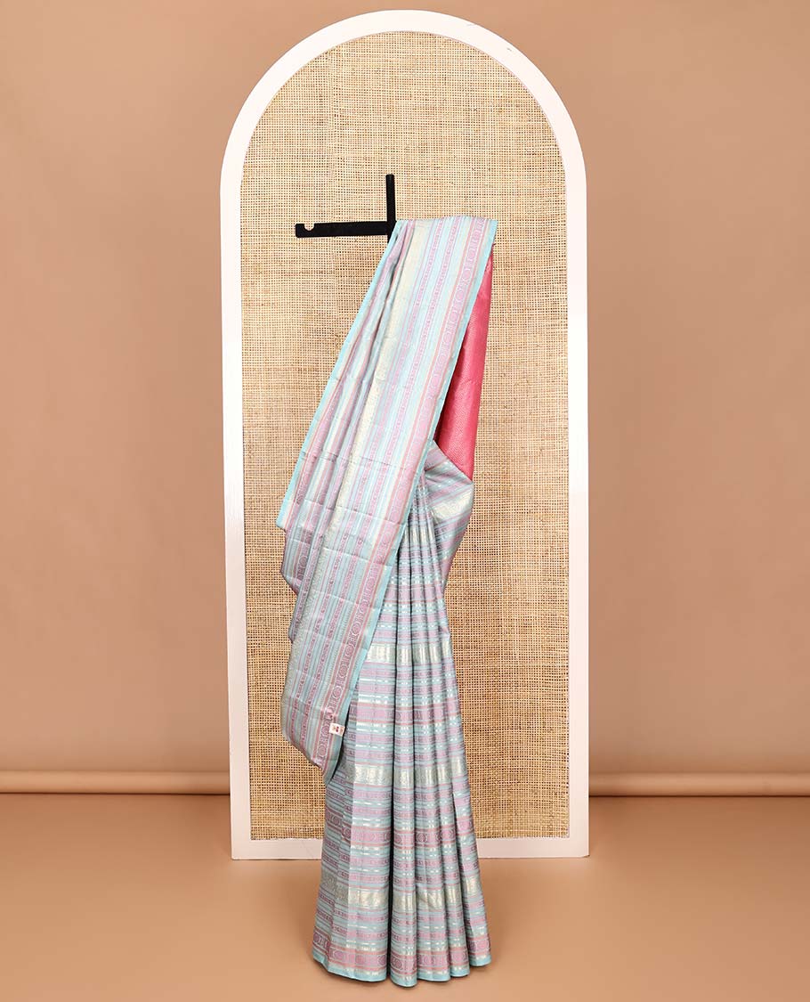 Borderless pastel blue traditional motifs steeped Kanchipuram silk saree, contrast pallu of mayil kann designs