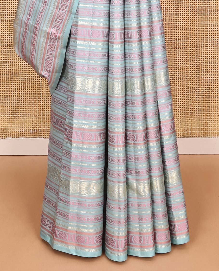 Borderless pastel blue traditional motifs steeped Kanchipuram silk saree, contrast pallu of mayil kann designs