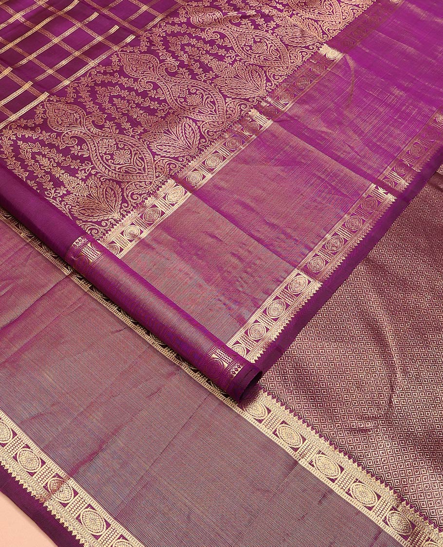Purple thick zari checked with Mughal buttas designer saree, rettai pettu border of thilakam mokku, muthu, and chakram designs, and mayil kann design pallu