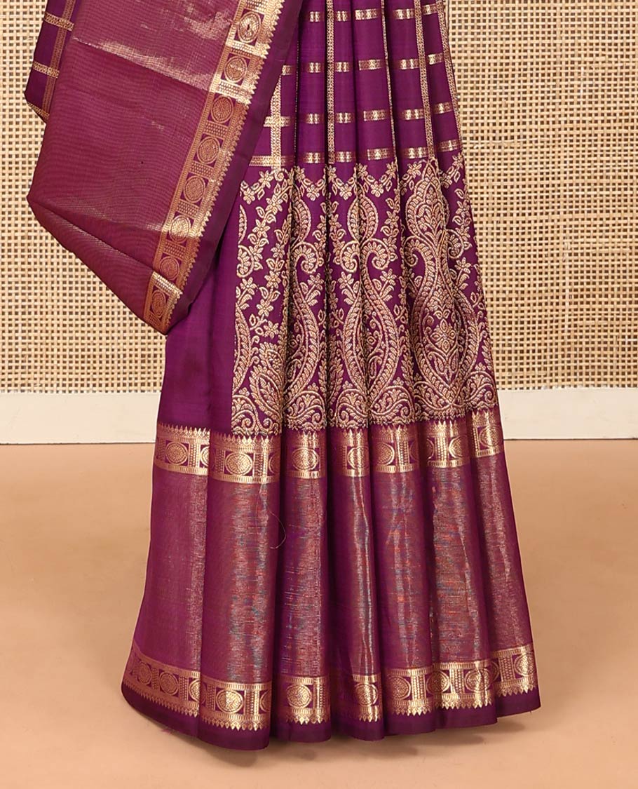 Purple thick zari checked with Mughal buttas designer saree, rettai pettu border of thilakam mokku, muthu, and chakram designs, and mayil kann design pallu