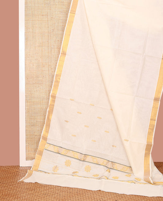 Cream Kerala Saree, Elevated with Zari Buttas on Its Body, Subtly Sparkled Bavanji Border, Pallu Woven in Zari Floral Designs, and Paired with a Matching Blouse