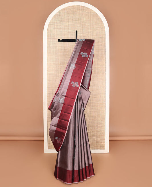 Pink soft silk saree with zari floral buttas, contrast floral design border & zari-rich jaal pallu