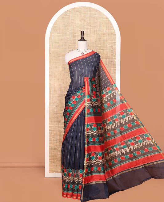 Blue Printed Silk Saree Subtly Imaged With Vertical Stripes On Its Body, Complemented By A Contrast Geometric Motif Printed Border, Pallu Steeped With Geometric Motif Print, And A Contrast Blouse