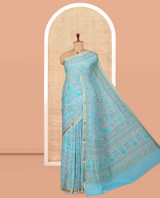 Blue Printed Silk Saree, Bedecked with Floral Vine Print, a Traditional Zari Piping Border, Floral Pallu, and a Matching Blouse