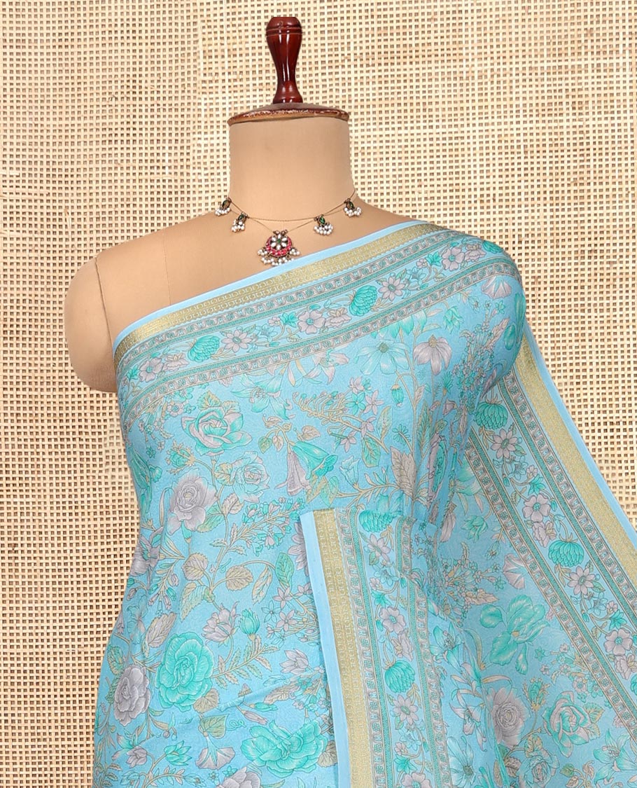 Blue Printed Silk Saree, Bedecked with Floral Vine Print, a Traditional Zari Piping Border, Floral Pallu, and a Matching Blouse