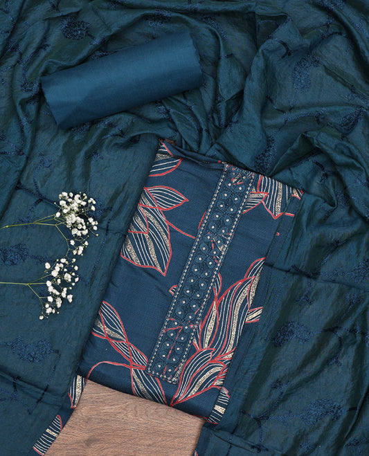 Blue Material Chudidar Set, Embellished with Leaf-Floral Print and Neck Embroidery on Rayon Top, a Plain Rayon Bottom, and Paired with a Matching Embroidered Chanderi Silk Dupatta