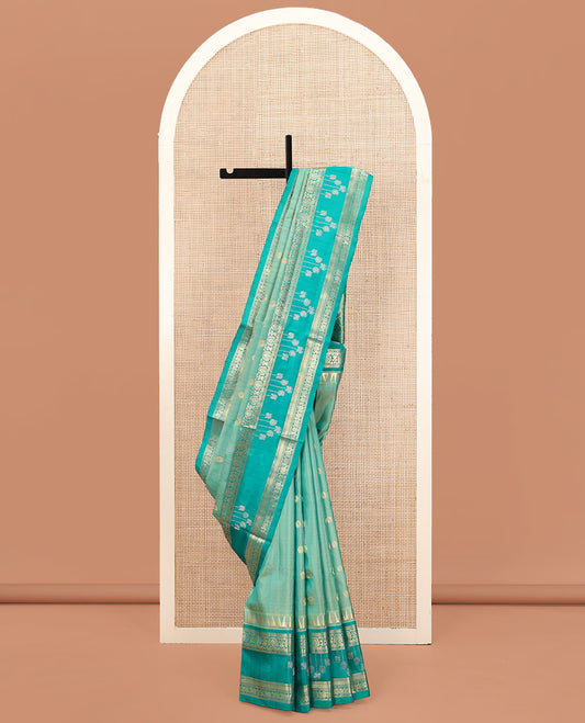 Blue Venkatagiri Silk Saree, Mesmerized with Zari Buttas All Over Its Body, Complemented by a Contrast Temple Traditional Zari Designs Border, Grand Pallu of Jaal Designs, and Paired with a Contrast Blouse