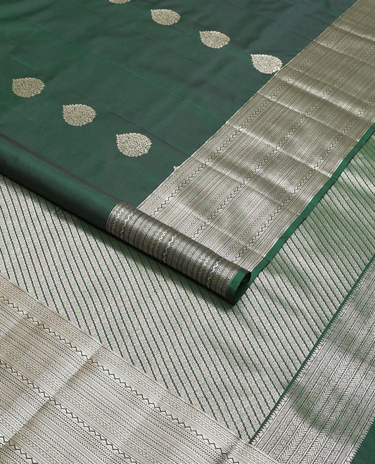 Dark green leaf buttas vasundhara elite silk saree with self intricate zari design border & floral vine design pallu