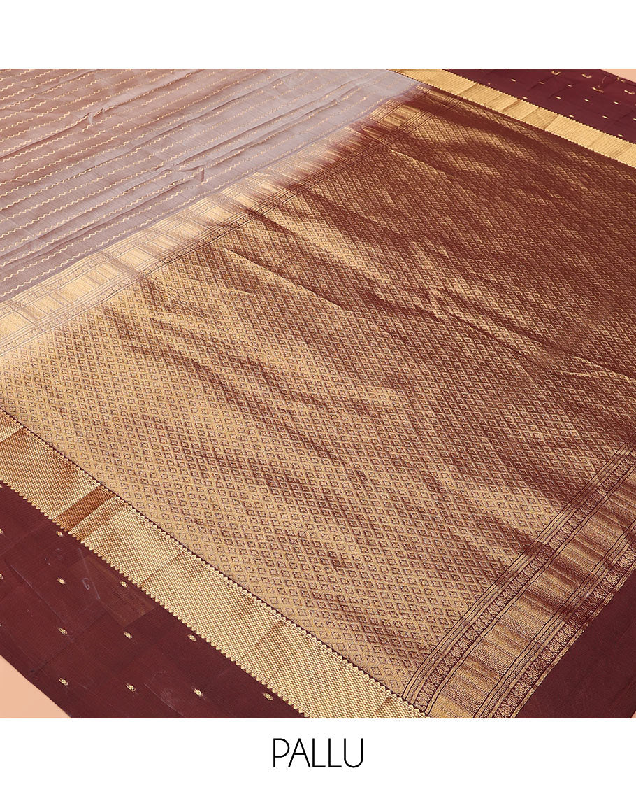 Grey Vasundhara Lite-Silk Mix Saree Enriched with Zig-Zag Zari Stripes, Complemented with a Contrast Border Featuring Rekku, Muthu, and Mayil Kann Design, Opulently Embellished Pallu of Jaal Design, and a Contrast Blouse