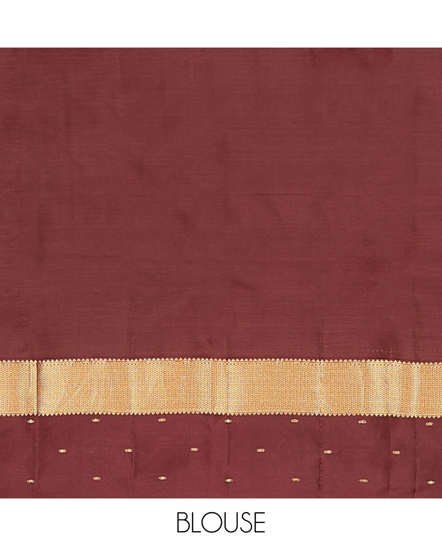 Grey Vasundhara Lite-Silk Mix Saree Enriched with Zig-Zag Zari Stripes, Complemented with a Contrast Border Featuring Rekku, Muthu, and Mayil Kann Design, Opulently Embellished Pallu of Jaal Design, and a Contrast Blouse