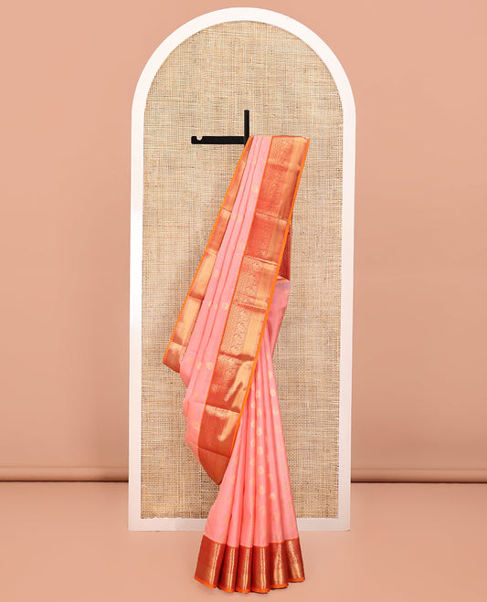 Pink Vasundhara Lite Silk Mix Saree, Spotlighted with Zari Buttas All Over Its Body, Complemented by a Contrast Border of Rekku, Rudraksham, Laddu Kamalam, Yaanai, and Mayil Kann Designs, Grand Jaal-Design Pallu, and Paired with a Contrast Blouse