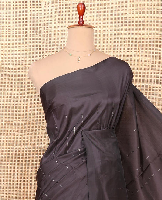 Borderless Black Banana Pith Saree Enriched with Zari Buttas, Complemented by a Contrasting Pallu of Buttas and Stripes, and Paired with a Contrast Plain Blouse