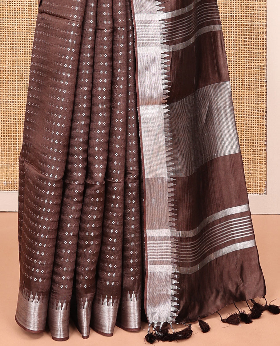 Brown Banana Pith Saree, Richly Detailed with Diamond Buttas All Over Its Body, Subtle Temple Zari Border, Pallu Steeped with Stripes, and Paired with a Matching Blouse