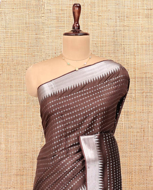 Brown Banana Pith Saree, Richly Detailed with Diamond Buttas All Over Its Body, Subtle Temple Zari Border, Pallu Steeped with Stripes, and Paired with a Matching Blouse