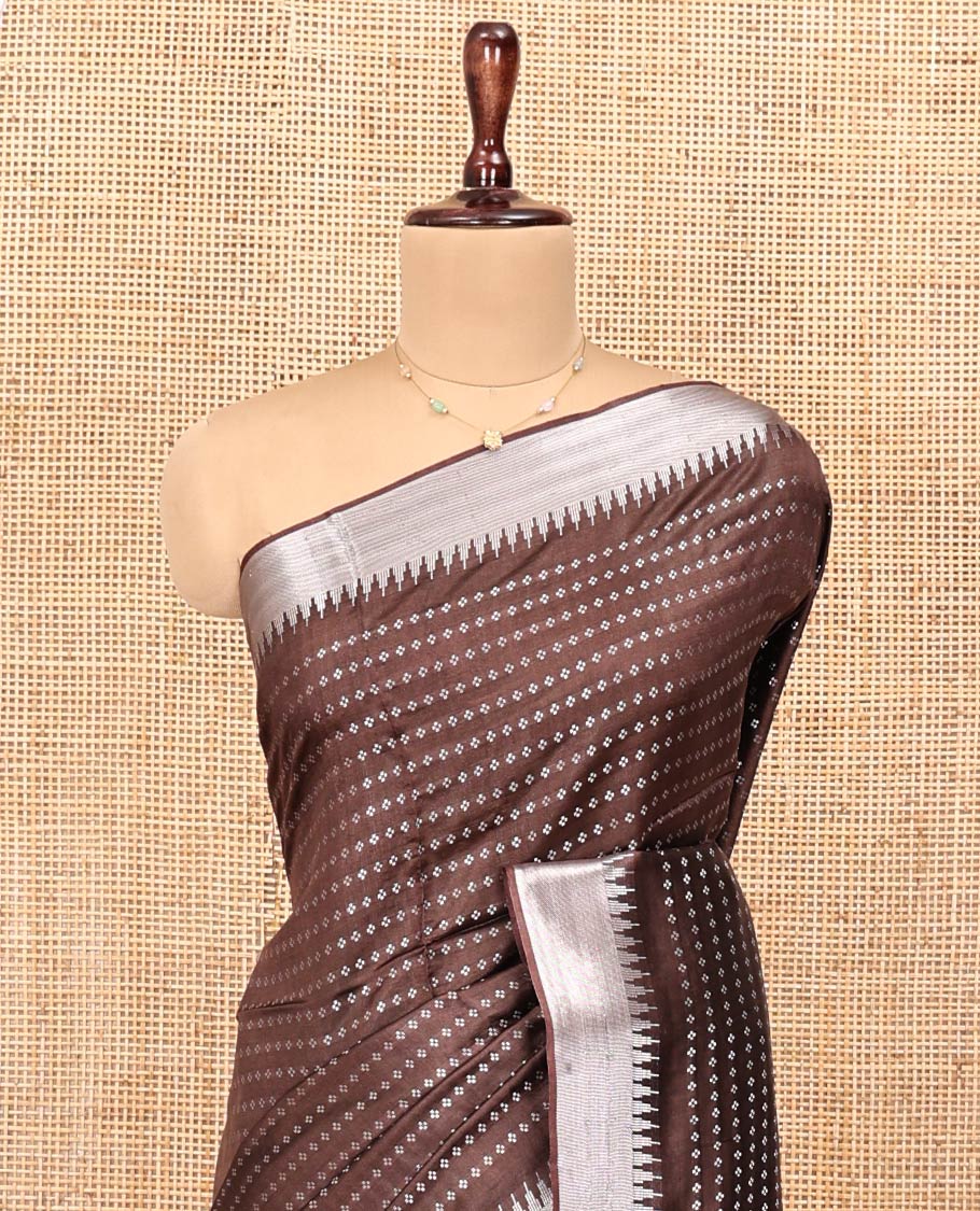 Brown Banana Pith Saree, Richly Detailed with Diamond Buttas All Over Its Body, Subtle Temple Zari Border, Pallu Steeped with Stripes, and Paired with a Matching Blouse